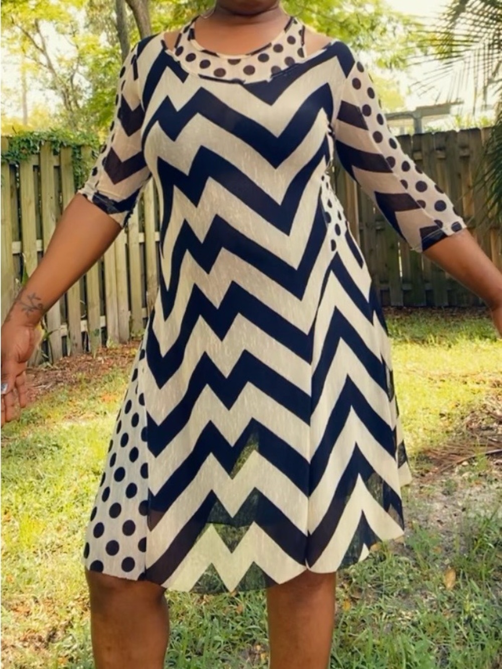 Black and Cream Polkadot Swing Dress with Three-Quarter Sleeves